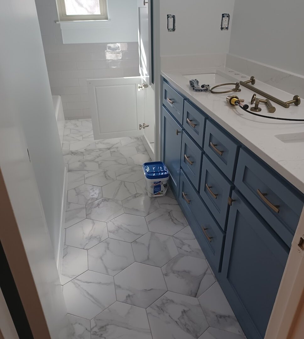 Stunning bathroom remodel featuring modern fixtures, stylish tilework, and a spacious layout, showcasing J&B Construction's exceptional craftsmanship in North Texas.